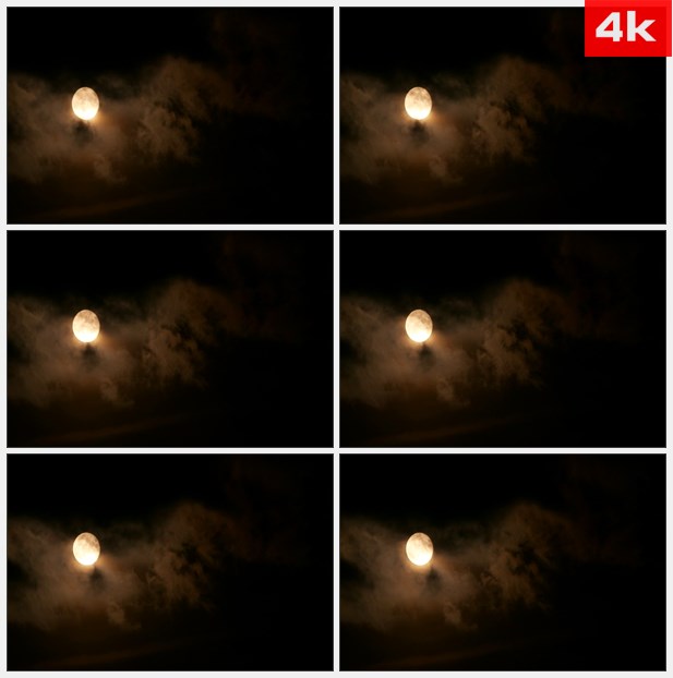 4K0047夜晚黄色的月亮照射着乌云 高清实拍视频素材