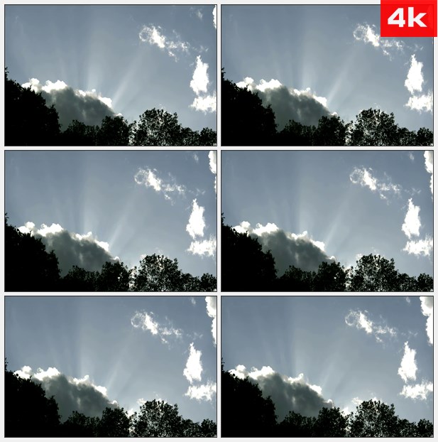 4K0080阳光穿过乌云和树顶 高清实拍视频素材