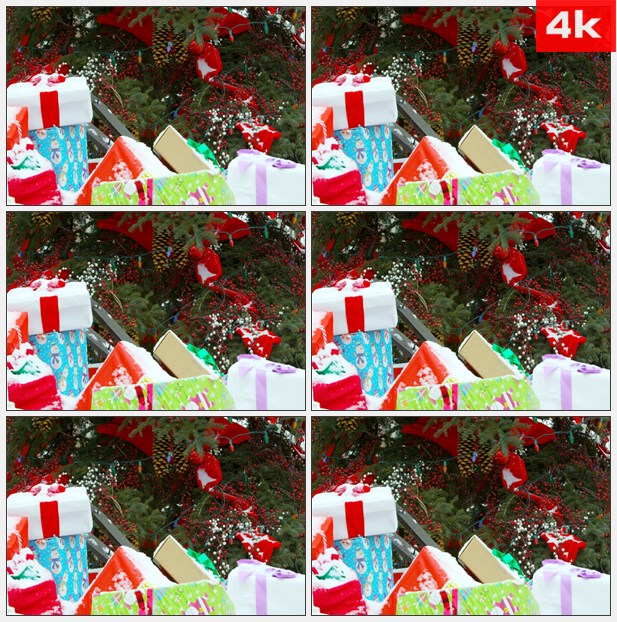 4K0114下雪圣诞树下的礼物高清实拍视频素材