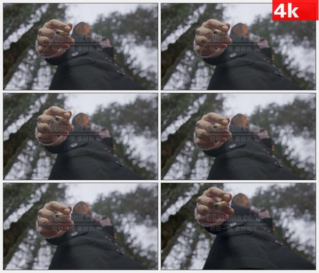 4K0851低角度点燃的香烟夹着香烟的手特写高清实拍视频素材