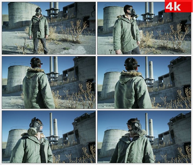 4K1247男子用防毒面具测量废弃的发电厂高清实拍视频素材