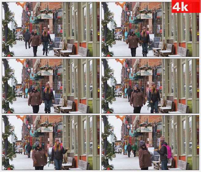 4K1290欧美人们在雪中逛街散步高清实拍视频素材