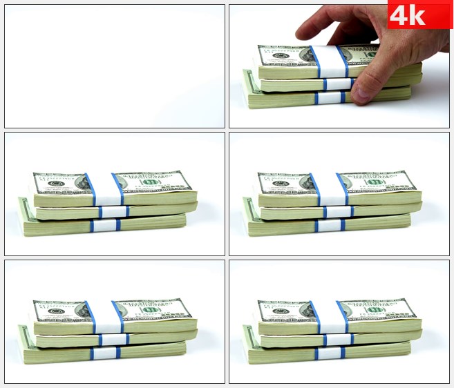 4K1380手放下三捆美国货币金融资本高清实拍视频素材
