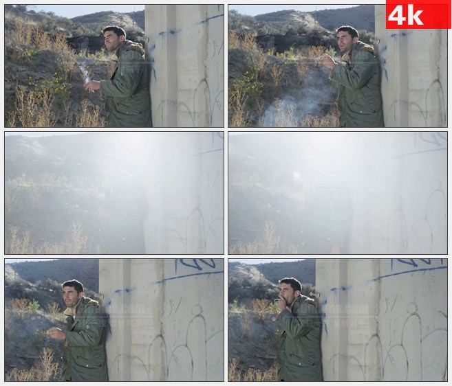 4K1414外国男人室外靠墙壁抽香烟高清实拍视频素材