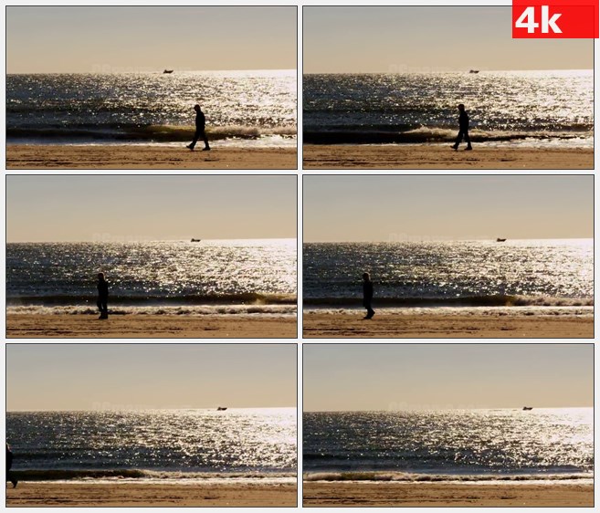 4K1506一个人走过海边沙滩夕阳余晖波光粼粼高清实拍视频素材