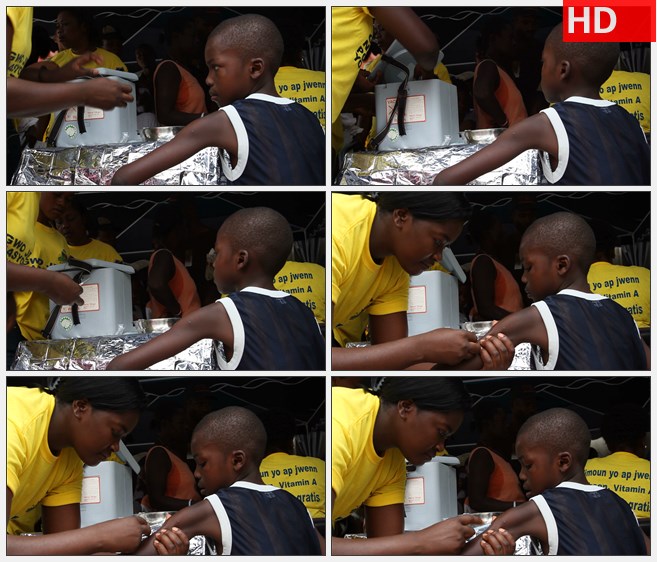 ZY1599海地青年接受志愿者接种疫苗高清实拍视频素材