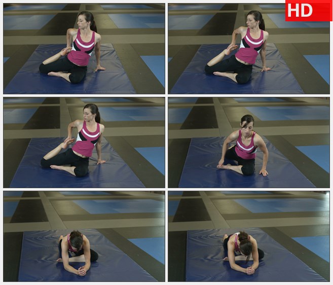 ZY1681女人在健身房做运动前的伸展运动高清实拍视频素材