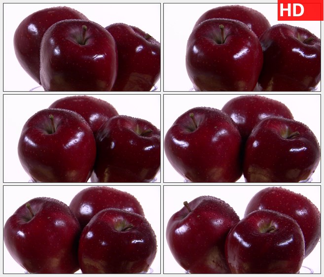 ZY1697三个红苹果在白色的背景下旋转高清实拍视频素材